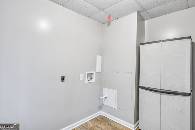 77 Springfield Ct, Newnan, GA 30265 - laundry area featuring hookup for a washing machine, baseboards, wood finished floors, laundry area, and hookup for an electric dryer