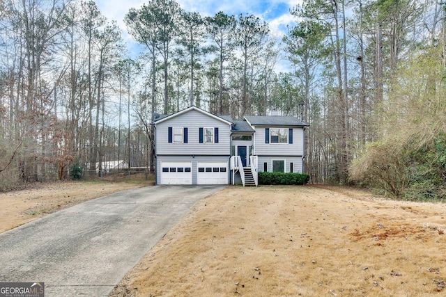 split foyer home featuring a garage