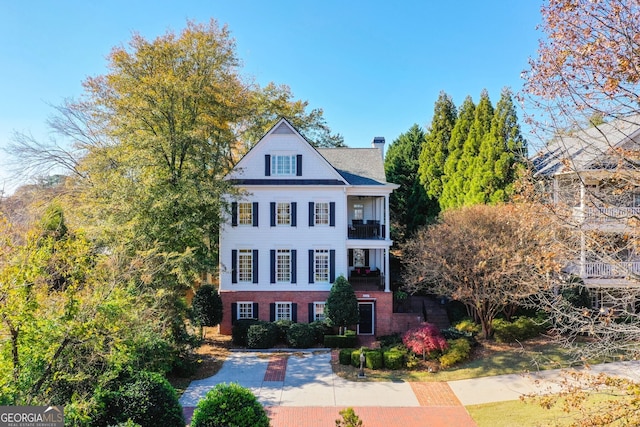 view of front of home with a balcony