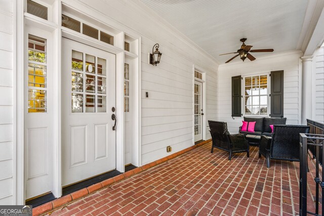 exterior space with ceiling fan and a porch