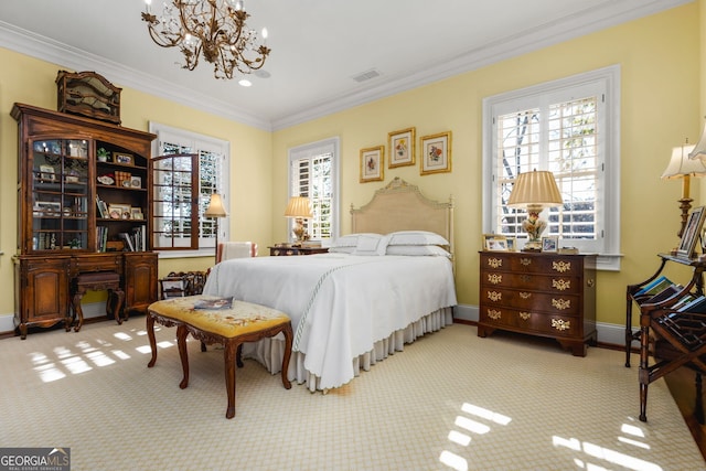 carpeted bedroom featuring ornamental molding and an inviting chandelier