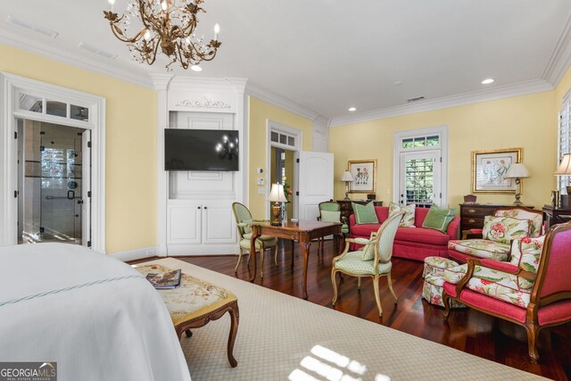 living room featuring a notable chandelier, wood-type flooring, and crown molding