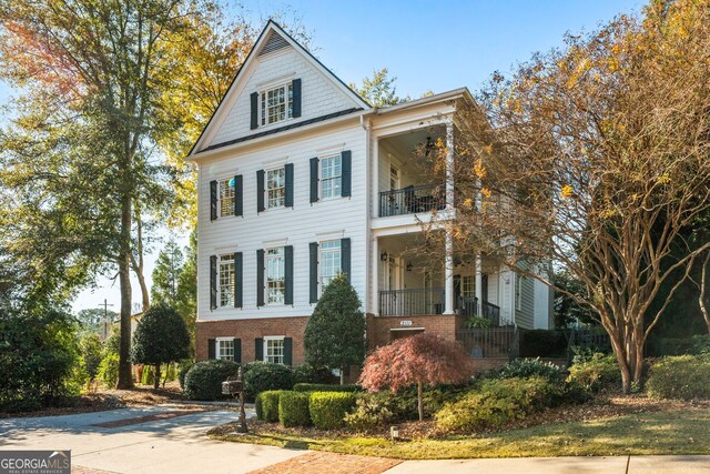 view of front of home with a balcony