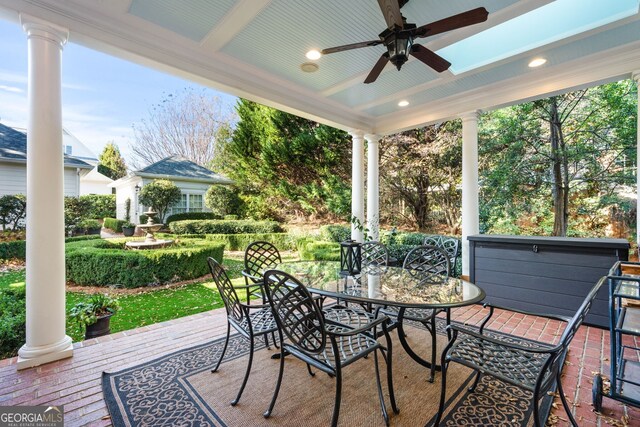 view of patio featuring ceiling fan