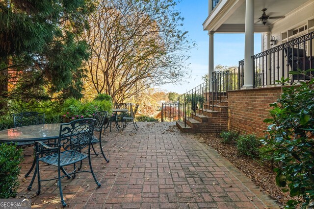 view of patio / terrace featuring ceiling fan