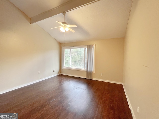 1153 Village Main St, Stone Mountain, GA 30088 - empty room with lofted ceiling with beams, dark wood-style flooring, a ceiling fan, and baseboards