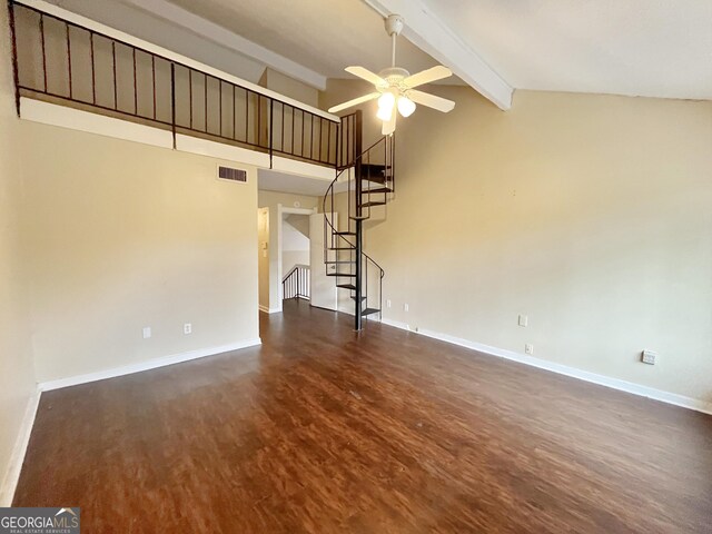 1153 Village Main St, Stone Mountain, GA 30088 - unfurnished living room featuring beam ceiling, visible vents, dark wood finished floors, and baseboards