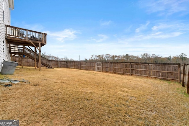 view of yard featuring a wooden deck