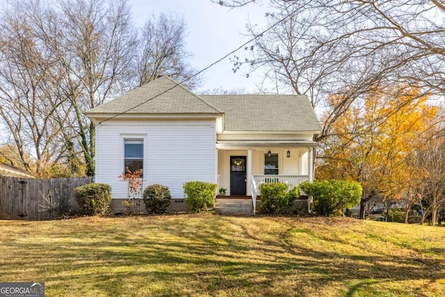 bungalow-style home with a porch and a front lawn