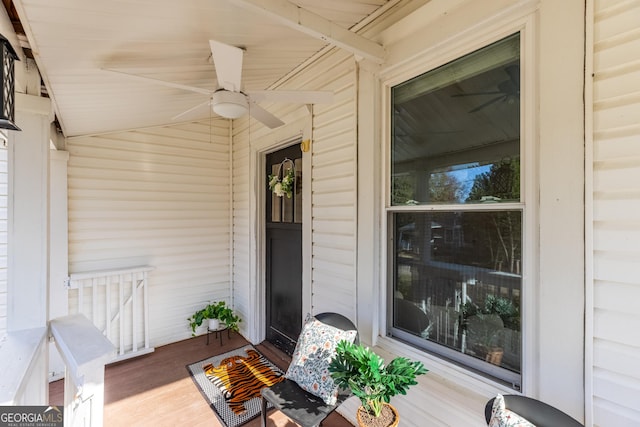 wooden terrace with ceiling fan