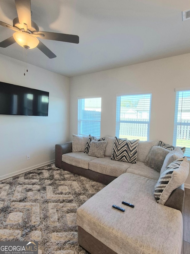 living room with ceiling fan