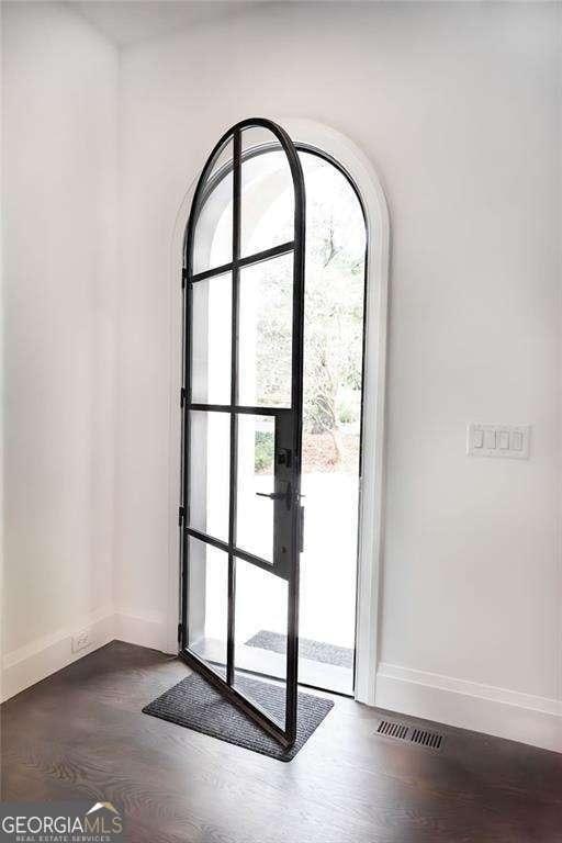 entryway featuring dark hardwood / wood-style flooring