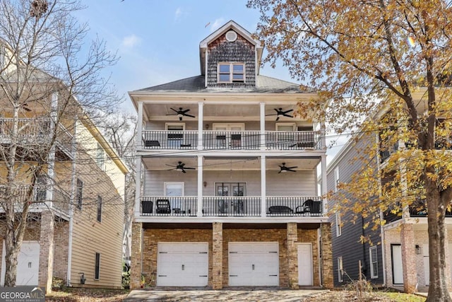 view of front of house with a balcony and a garage