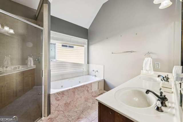 bathroom with plus walk in shower, vanity, and vaulted ceiling