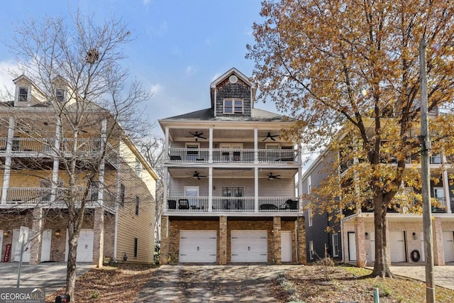 view of front of home featuring a balcony and a garage