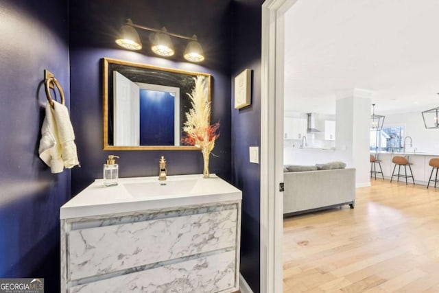 bathroom featuring vanity and hardwood / wood-style flooring