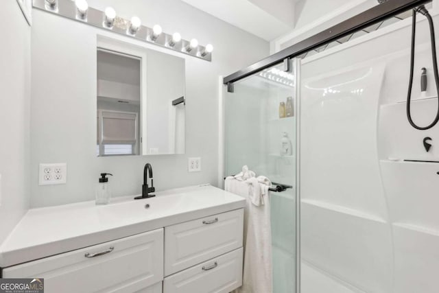 bathroom featuring vanity and walk in shower