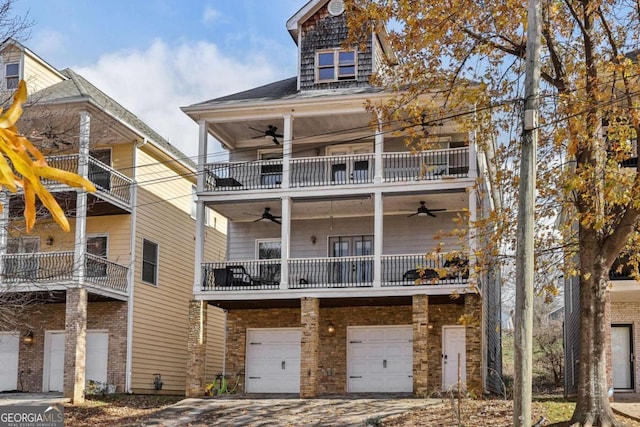 view of front of home with a balcony and a garage