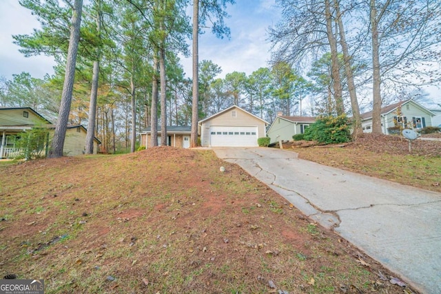 ranch-style house featuring a garage