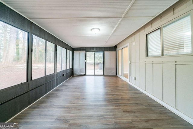 unfurnished sunroom with a healthy amount of sunlight