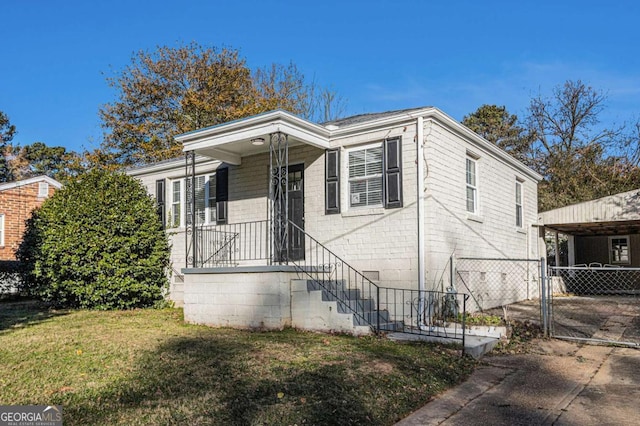 view of front of house with a front lawn and a porch