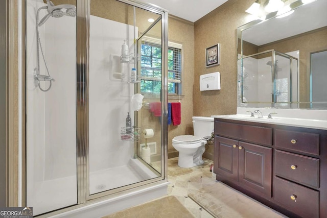 bathroom featuring tile patterned flooring, vanity, toilet, and a shower with door