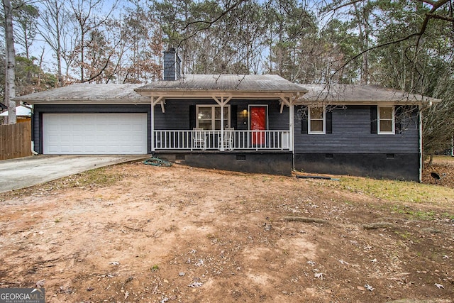 single story home featuring a porch and a garage