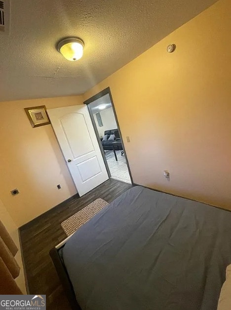 bedroom with a textured ceiling