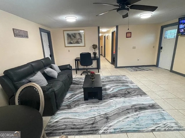 living room featuring light tile patterned floors and ceiling fan