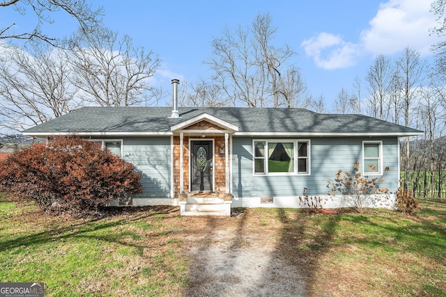 ranch-style home with a front yard