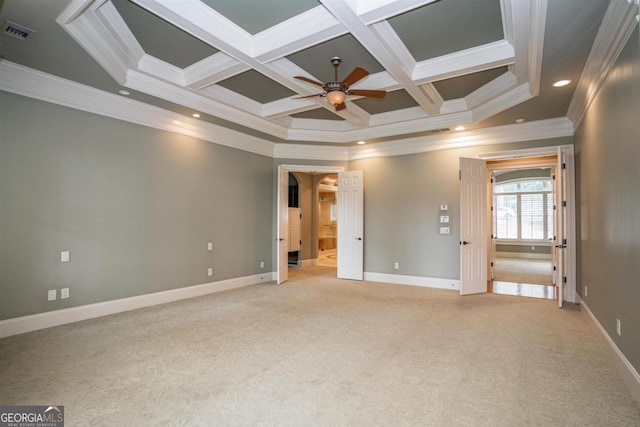 empty room featuring beam ceiling, crown molding, ceiling fan, and coffered ceiling