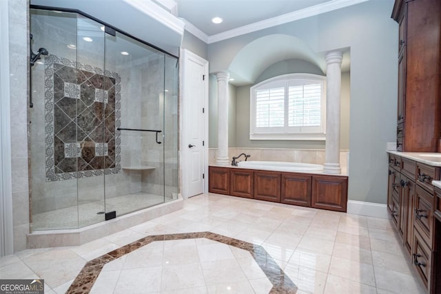 bathroom featuring tile patterned floors, ornate columns, ornamental molding, vanity, and separate shower and tub