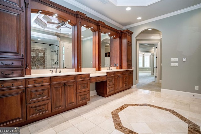 bathroom with ceiling fan, walk in shower, tile patterned floors, vanity, and ornamental molding