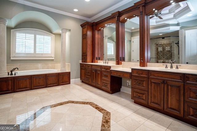 bathroom with ornate columns, tile patterned flooring, separate shower and tub, vanity, and ornamental molding