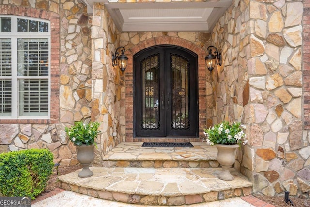 property entrance with french doors