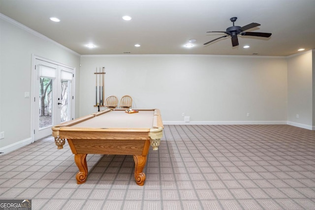 recreation room with light colored carpet, ornamental molding, and french doors