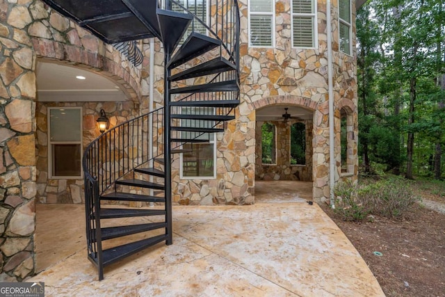 doorway to property with a patio