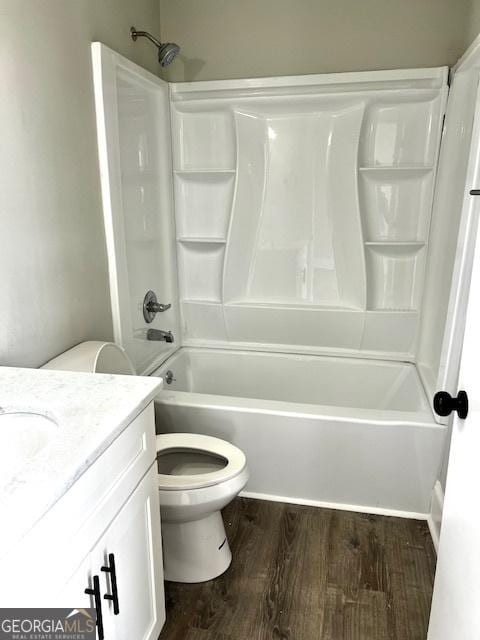 full bathroom with wood-type flooring, vanity, toilet, and shower / bathtub combination