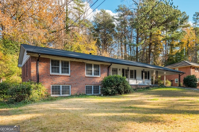 view of front facade with a porch and a front lawn