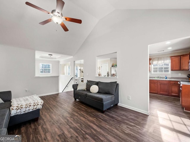 living room featuring ceiling fan, sink, high vaulted ceiling, and dark hardwood / wood-style floors