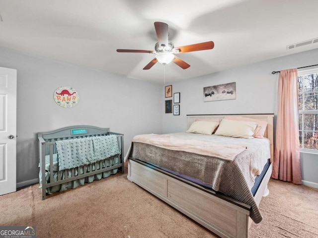 bedroom with carpet flooring and ceiling fan