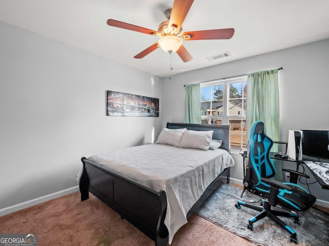 bedroom featuring ceiling fan and carpet floors