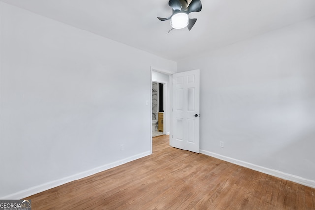 unfurnished room with light hardwood / wood-style floors