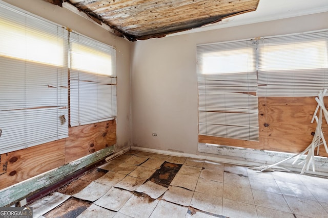 empty room with wooden ceiling