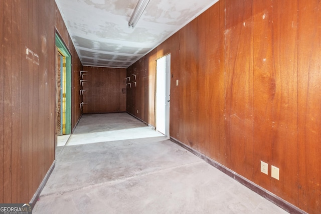 hallway with wooden walls