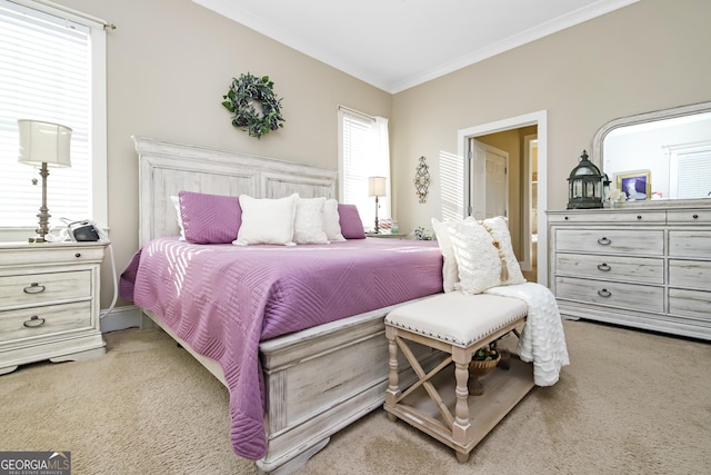 bedroom with carpet floors and ornamental molding