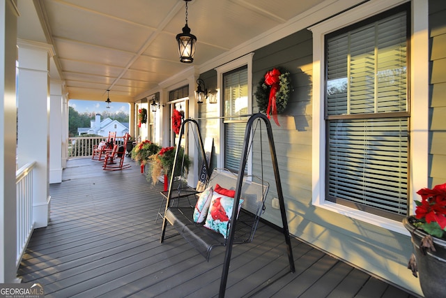 deck featuring covered porch