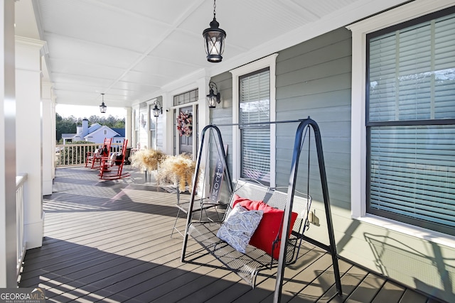 wooden deck featuring a porch