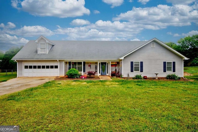 single story home featuring a garage and a front lawn