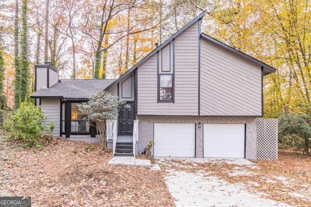 view of front of property with a garage